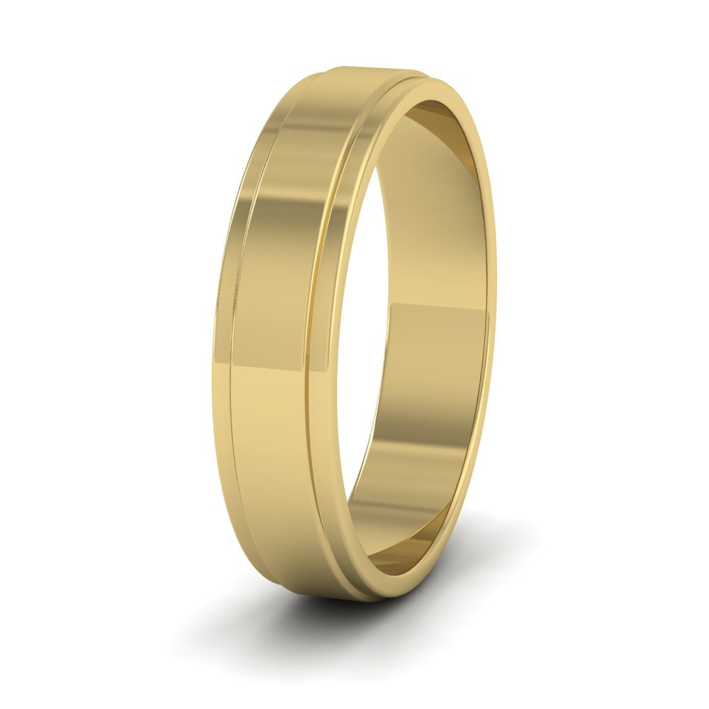 <p>18ct Yellow Gold Stepped Edge Pattern Flat Wedding Ring.  5mm Wide </p>