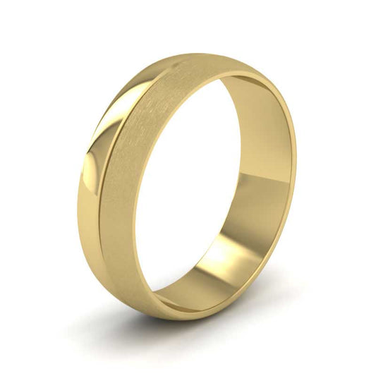 <p>18ct Yellow Gold Matt And Polished Line Patterned Wedding Ring.  6mm Wide And Court Shaped For Comfortable Fitting</p>