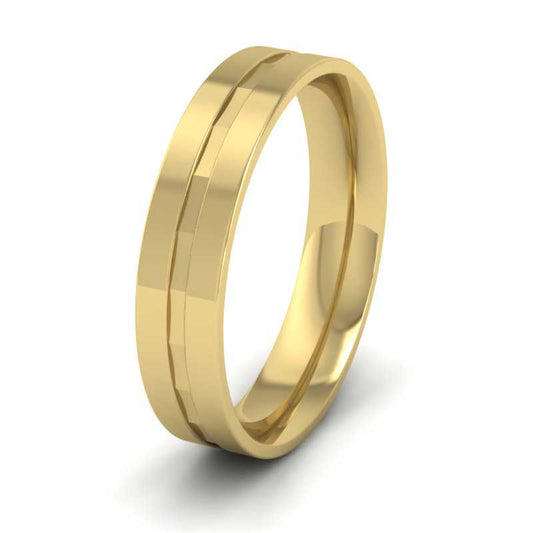 <p>18ct Yellow Gold Flat Facetted Groove Flat Wedding Ring.  5mm Wide And Court Shaped For Comfortable Fitting</p>