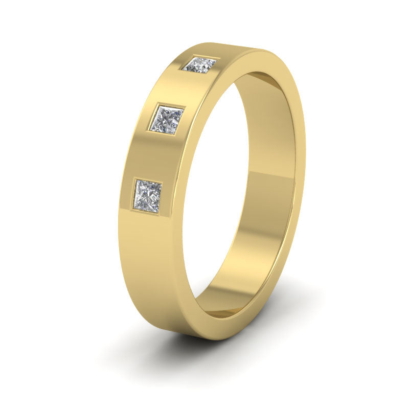 <p>18ct Yellow Gold Three Stone Princess Cut Diamond Set (0.12ct) Flat Wedding Ring.  4mm Wide </p>