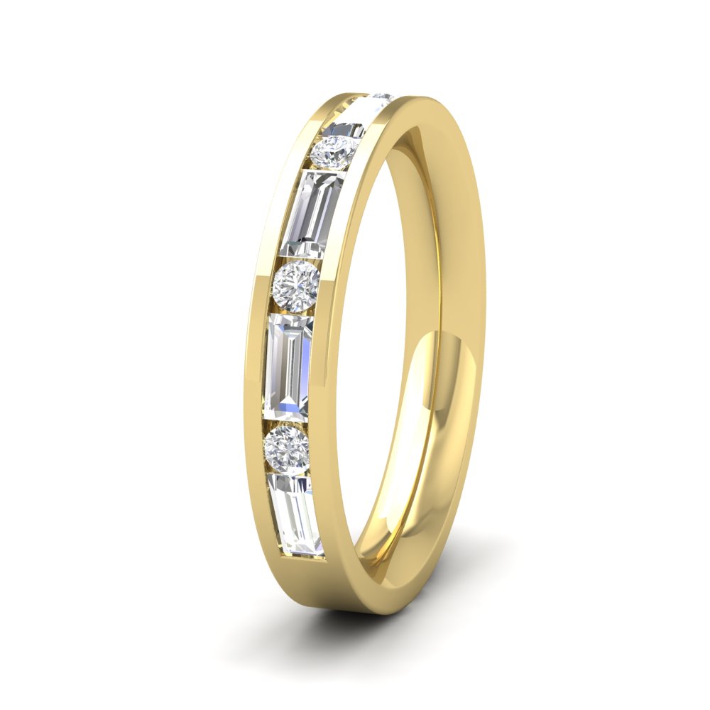 <p>9ct Yellow Gold Channel Set Alternate Baguette And Round Diamond Ring (0.75ct). 35mm Wide And Court Shaped For Comfortable Fitting</p>