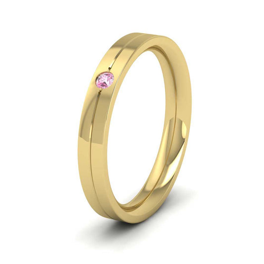 <p>14ct Yellow Gold Pink Sapphire Set Flat Wedding Ring With Line Pattern.  3mm Wide And Court Shaped For Comfortable Fitting</p>