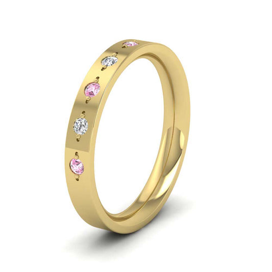 <p>14ct Yellow Gold Diamond And Pink Sapphire Set Flat Wedding Ring.  3mm Wide And Court Shaped For Comfortable Fitting</p>