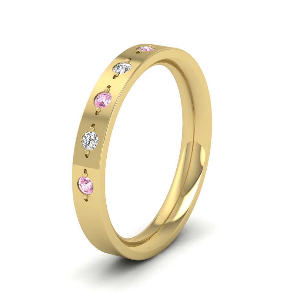 <p>22ct Yellow Gold Diamond And Pink Sapphire Set Flat Wedding Ring.  3mm Wide And Court Shaped For Comfortable Fitting</p>