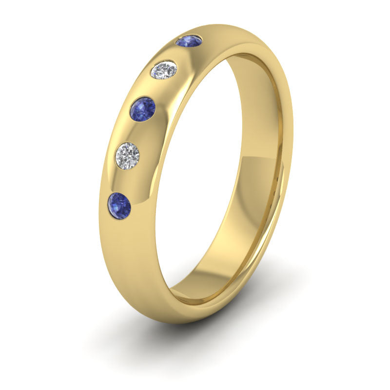 <p>14ct Yellow Gold Blue Sapphire And Diamond Flush Set Wedding Ring.  4mm Wide And Court Shaped For Comfortable Fitting</p>