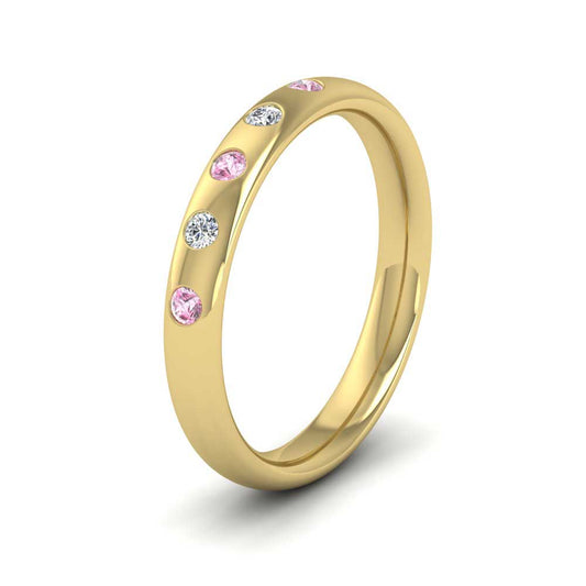 <p>18ct Yellow Gold Pink Sapphire And Diamond Flush Set Wedding Ring.  3mm Wide And Court Shaped For Comfortable Fitting</p>