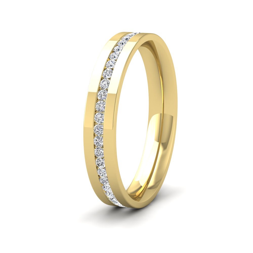 <p>9ct Yellow Gold Full Channel Set Round Diamond (0.5ct) Flat Wedding Ring.  35mm Wide And Court Shaped For Comfortable Fitting</p>