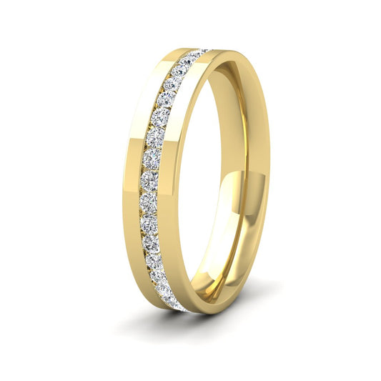 <p>18ct Yellow Gold Full Channel Set Round Diamond (0.6ct) Flat Ring.  4mm Wide And Court Shaped For Comfortable Fitting</p>