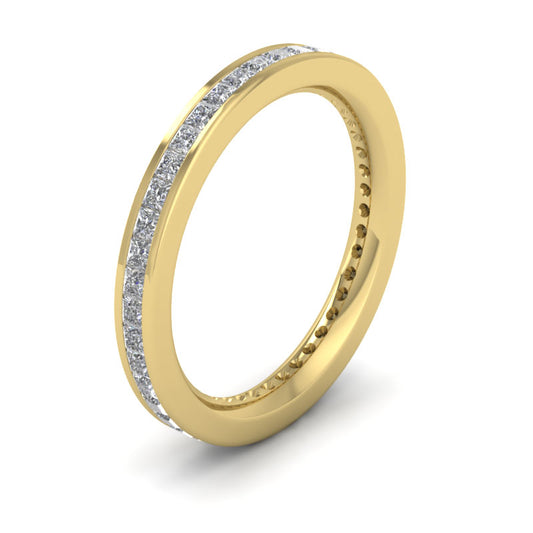 <p>Full Channel Set Princess Cut Diamond (0.9ct) Wedding Ring In 14ct Yellow Gold.  25mm Wide And Court Shaped For Comfortable Fitting</p>
