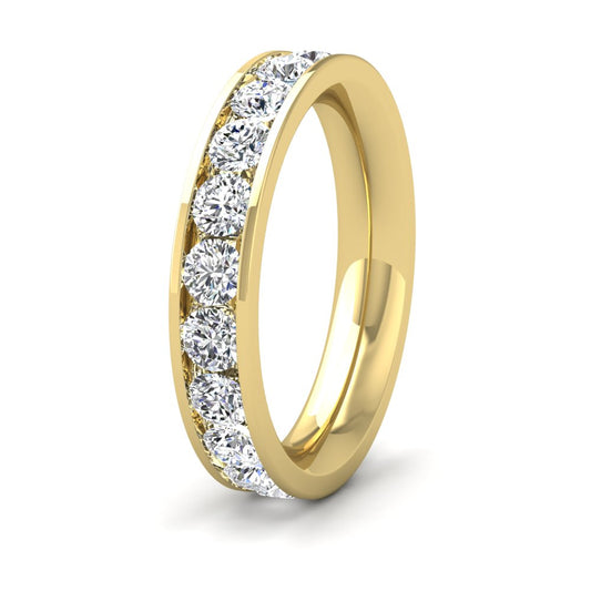 <p>18ct Yellow Gold Full Channel Set 2ct Round Brilliant Cut Diamond Wedding Ring.  4mm Wide And Court Shaped For Comfortable Fitting</p>