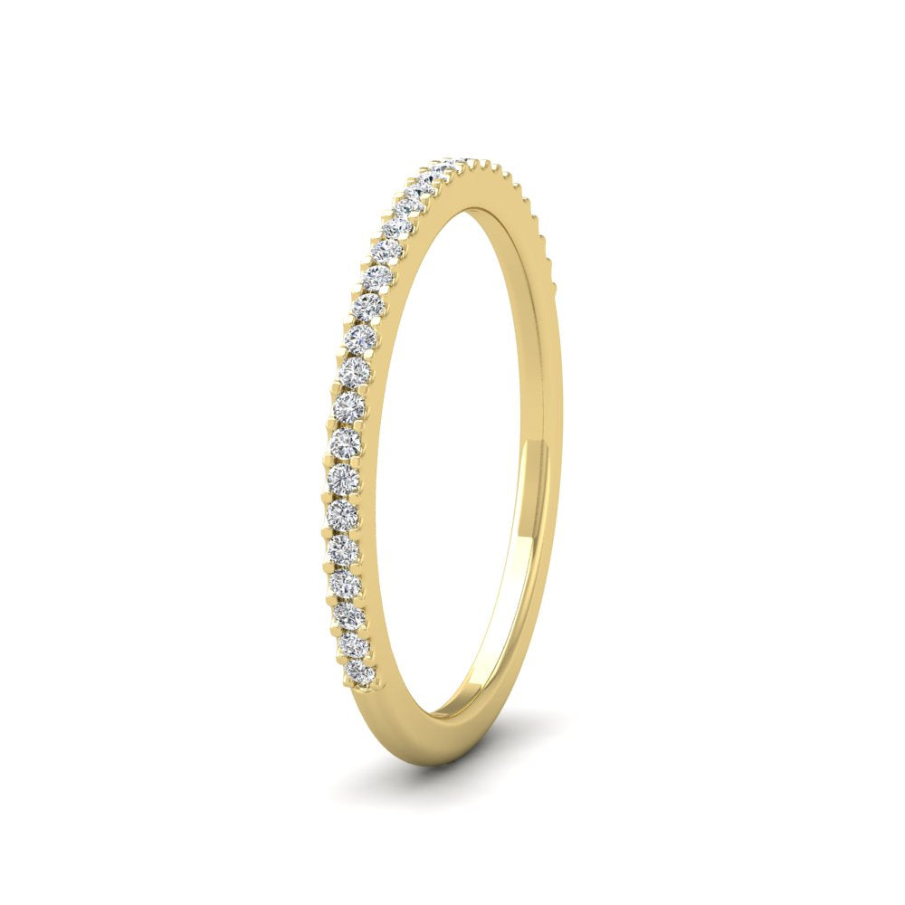 <p>18ct Yellow Gold Round Claw 0.13ct Half Diamond Set Wedding Ring.  15mm Wide And Court Shaped For Comfortable Fitting</p>
