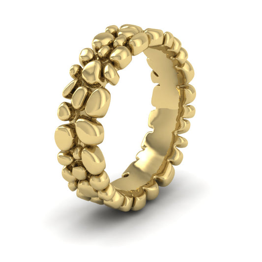 <p>Pebbles Wedding Ring In 22ct Yellow Gold.  7mm Wide And Court Shaped For Comfortable Fitting</p>