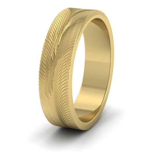 <p>14ct Yellow Gold Feather Pattern Flat Wedding Ring.  6mm Wide And Court Shaped For Comfortable Fitting</p>