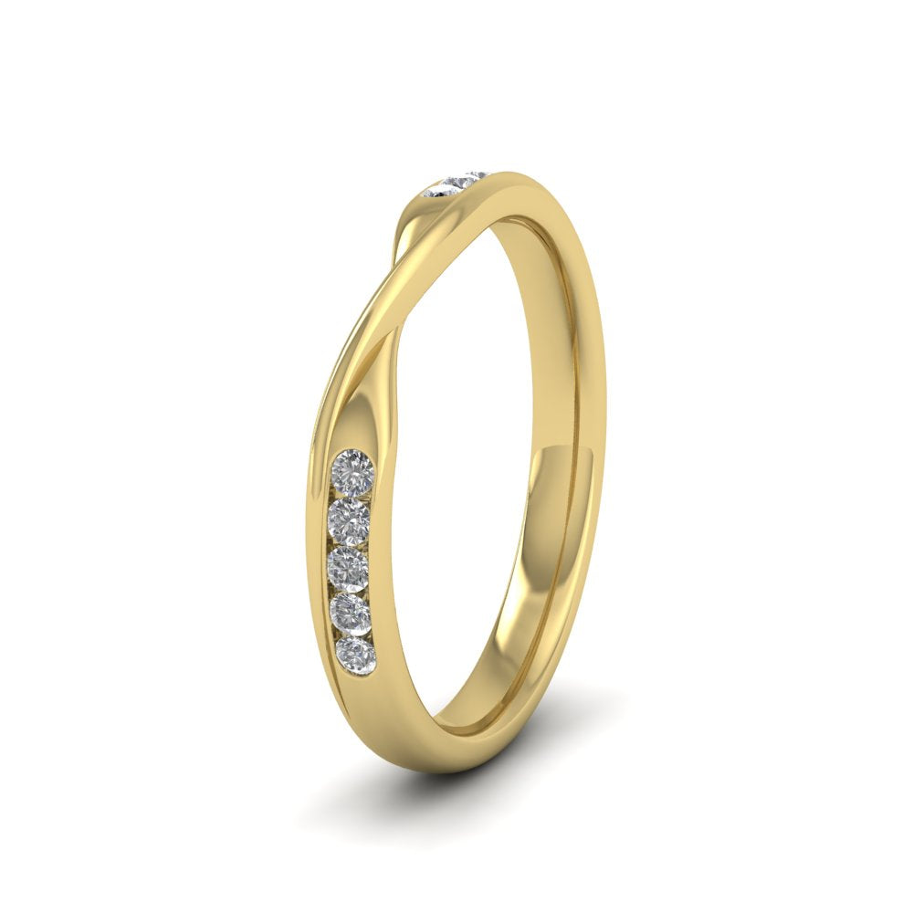 <p>9ct Yellow Gold Crossover Pattern Wedding Ring With Eight Channel Set Diamonds.  25mm Wide And Court Shaped For Comfortable Fitting.  Suitable For Fitting Next To Single Stone Rings Where The Stone And Setting Protrude Up To 0.75mm Away From The Edge Of The Ring.</p>