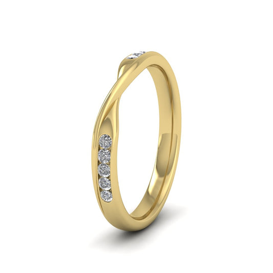 <p>9ct Yellow Gold Crossover Pattern Wedding Ring With Eight Channel Set Diamonds.  25mm Wide And Court Shaped For Comfortable Fitting.  Suitable For Fitting Next To Single Stone Rings Where The Stone And Setting Protrude Up To 0.75mm Away From The Edge Of The Ring.</p>