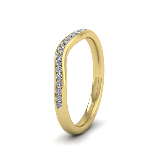 <p>9ct Yellow Gold Curved To Fit Channel Set Diamond Wedding Ring.  225mm Wide And Court Shaped For Comfortable Fitting.  Suitable For Fitting Next To Single Stone Rings Where The Stone And Setting Protrude Up To 1.5mm Away From The Edge Of The Ring.</p>