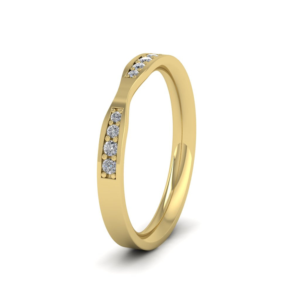 <p>9ct Yellow Gold Pinch Shaped Flat Wedding Ring With Eight Diamonds.  25mm Wide And Court Shaped For Comfortable Fitting.  Suitable For Fitting Next To Single Stone Rings Where The Stone And Setting Protrude Up To 0.75mm Away From The Edge Of The Ring.</p>